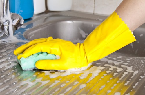 Team of house cleaners at work in a home